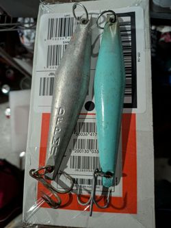 Surface iron. JJ two fish jigs and a CNC fishing