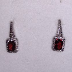Emerald Cut Garnet Earrings Set In Silver.