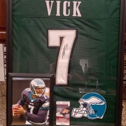 MICHAEL VICK OF THE PHILADELPHIA EAGLES CUSTOM STITCHED, SIGNED JERSEY WITH COA IN DISPLAY CASE.