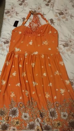 Four brand new women's summer dresses $6 each