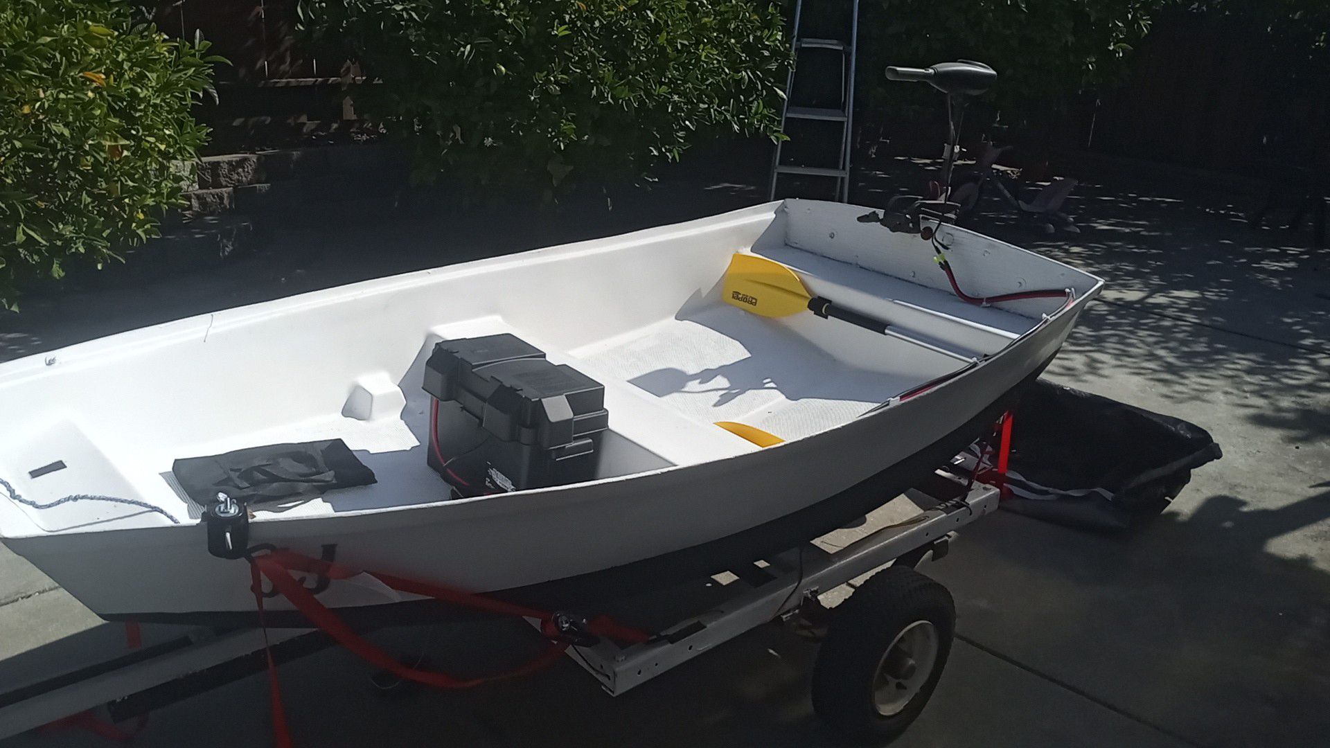 Mini fishing boat with trolling motor and trailer