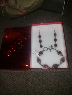 Sterling silver with ruby bracelet and earrings Make a great Christmas gift. Pickup in spartanburg. Make offer