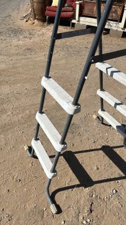 Pool ladder 59 inches high by 40 inches long and 16 inches wide