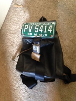 Recycled tire/license plate/seat belt backpack