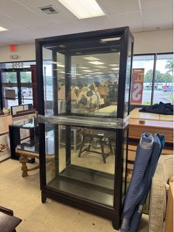 Tall black curio cabinet by Pulaski Furniture -  42” x 14.5” x 82”