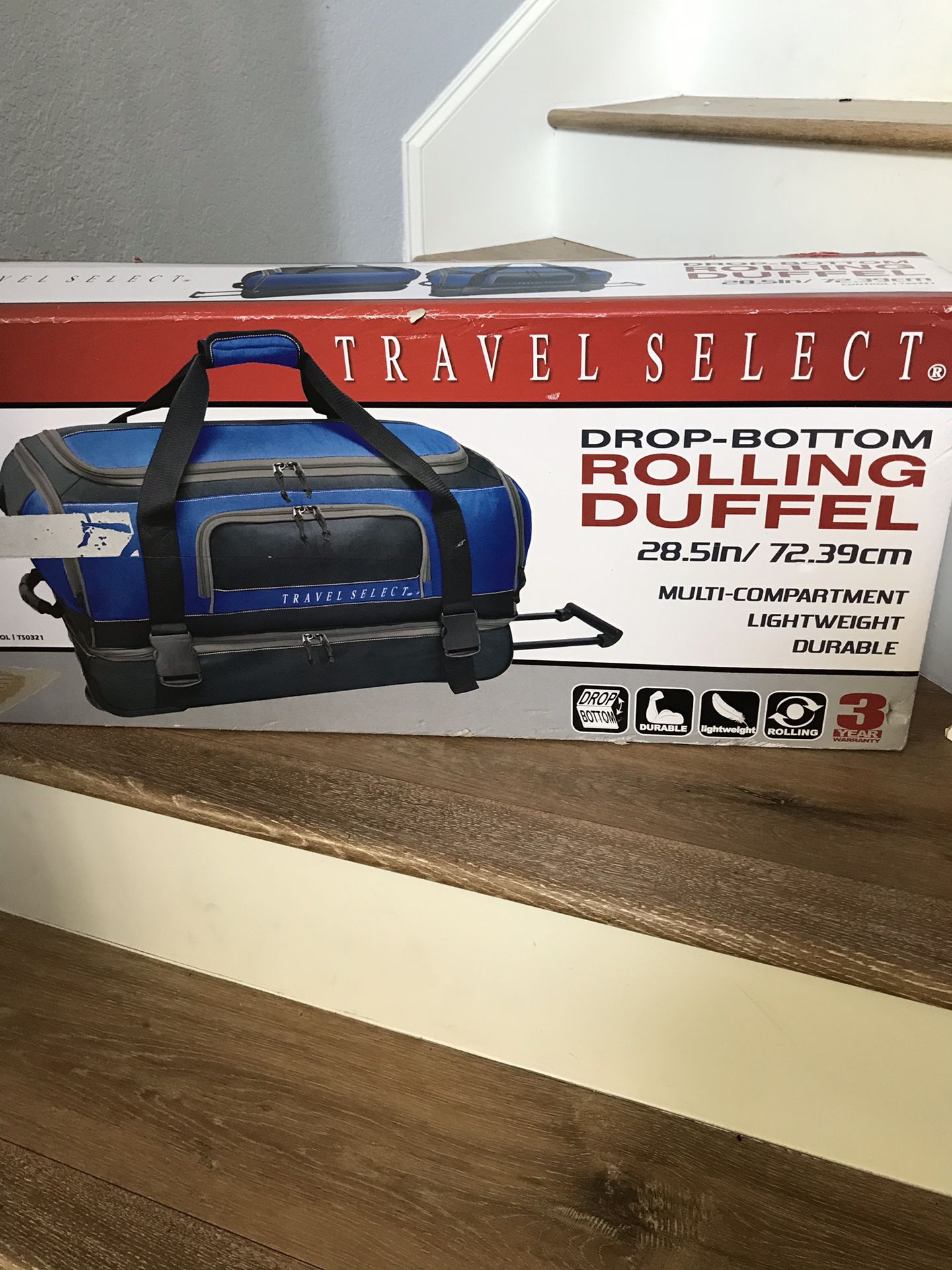 New Blue rolling travel duffel bag