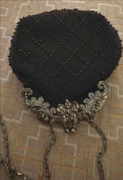 Cute silver plated black bag good condition $35.00