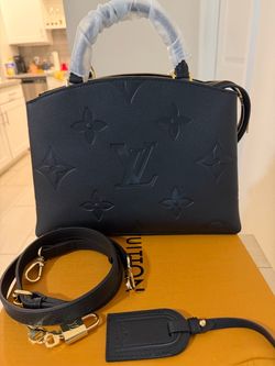 Petit cross body bag