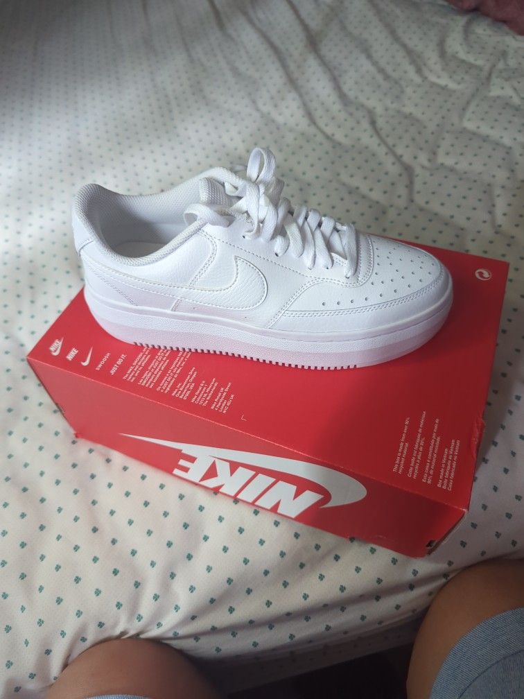 White Nike Shoes.