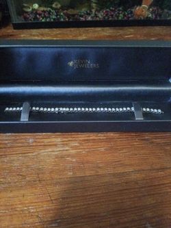 Lab diamond 3 ct. sterling silver bracelet for $600.latch broke I paid almost $2000 for it
