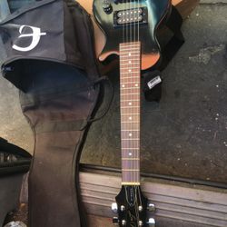 Mini Guitar And A Mandolin 
