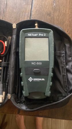 This is a Greenlee NC-500 NETcat Pro 2 digital VDV wiring troubleshooter kit, designed for testing twisted pair, coax, and network cables.