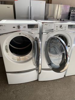 WHIRLPOOL front load washer and electric dryer with pedestals in excellent conditions with 4 months warranty