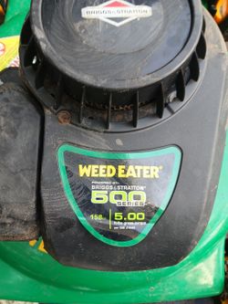 WEED EATER  BRIGGS & STRATTON 500 SERIES  22" LAWN MOWER WORKS REALLY GOOD AND CUTS GREAT ALL IT NEEDS IS A BUBBLE  YOU CAN GET THAT JUST ABOUT ANYWHE