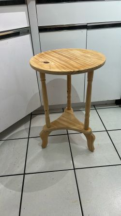 Unfinished wooden plant stand/accent table.