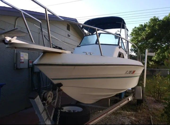 1990 Chaparral Boat 21 ft with 1990 Magic Tilt Aluminum Trailer