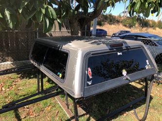Camper shell for Chevy s10 will fit other mall truck. 59x76long