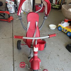 Radio Flyer Stroller Tricycle, EZ Fold 4-in-1 Stroll 'N Trike for Infant & Toddler, Red