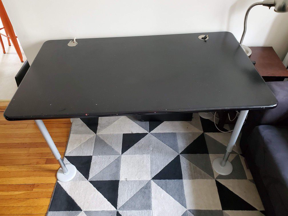 Large office table with adjustble legs