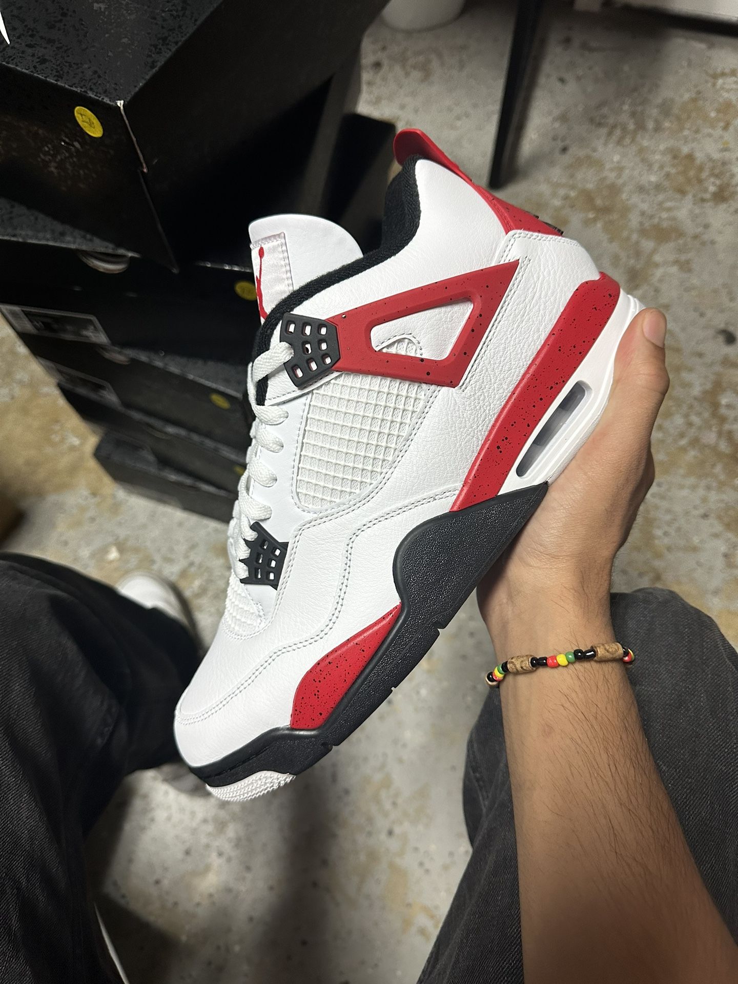 Jordan 4 Red cement