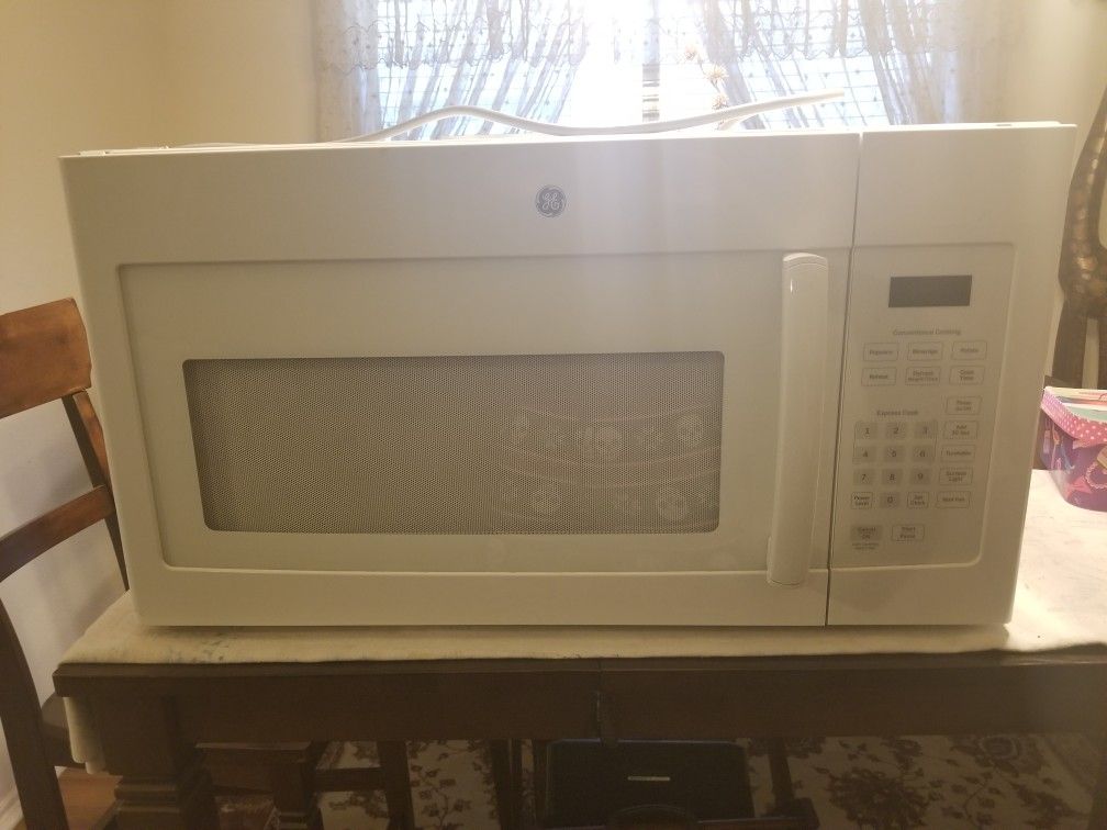 Brand new GE 1.6 Cu. Ft. Over-the-Range Microwave Oven Model number JVM3160DF3WW