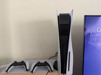 PS5 with disk drive with controllers