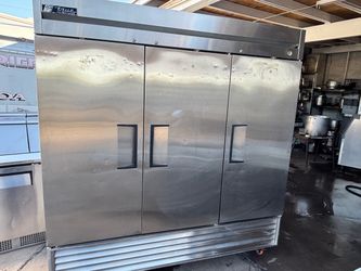 True three-door refrigerator in perfect condition; very clean inside and out.