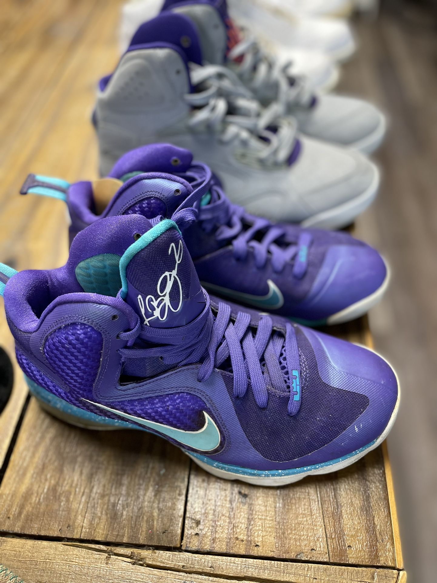 Nike LeBron James purple and teal high tops size 8