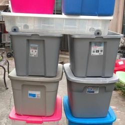 11 Storage Containers Mixed Sizes 18/20 Gallons 1 Size Gallons One Is The One That Goes Underneath Has Wheels 