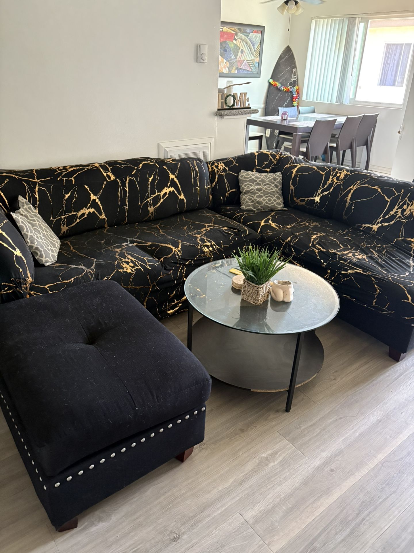 Black Sectional Couch With Patterned Couch Cover