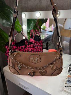 Brown /tan true religion purse