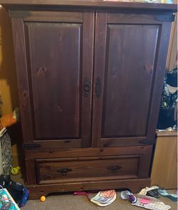 TV stand made into a dresser closet