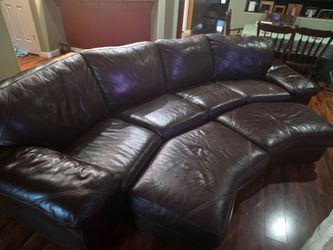 Leather sectional couch with 2 ottomans