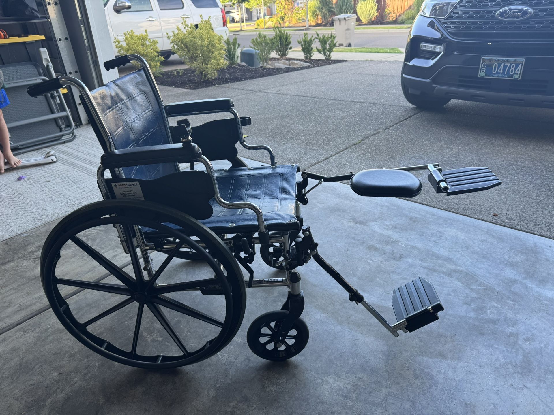 Wheelchair With Adjustable Leg Rests