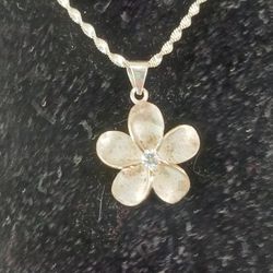 Gorgeous Sterling Silver .925 Plumera Flower Necklace Adorned With A Cubic Zirconia In The 🌼 Flower Making This Piece Even More Stunning . 