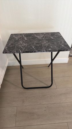 Foldable marble design table