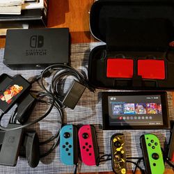 Used Nintendo Switch With Various Accessories