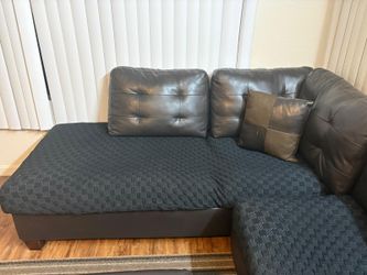 L-Shaped Sectional Couch + Ottoman + Rug + Pillows