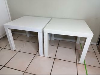 Two IKEA white side tables