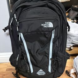 The North Face, Surge Transit Backpack, Black with light blue trimming