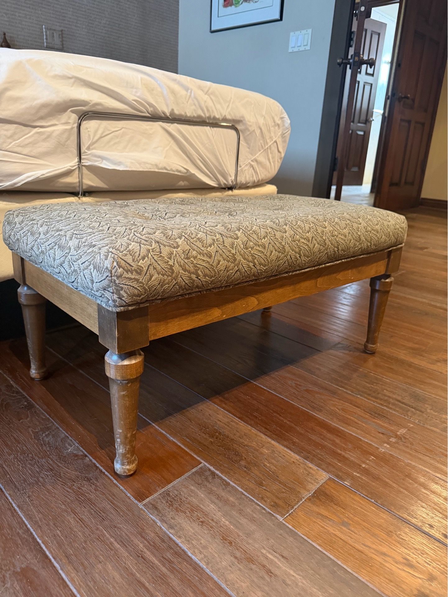 Vintage upholstered footstool ottoman