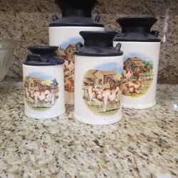 4 Piece Antique Canisters