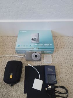 NEW Canon PowerShot SD1000 camera + extras!