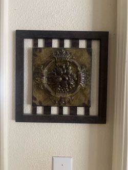 Metal framed artwork