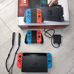 Nintendo Switch With Extra Set Of Joy Con Controllers