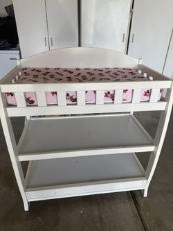 Diaper change include pad