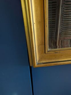 Gold framed mirror