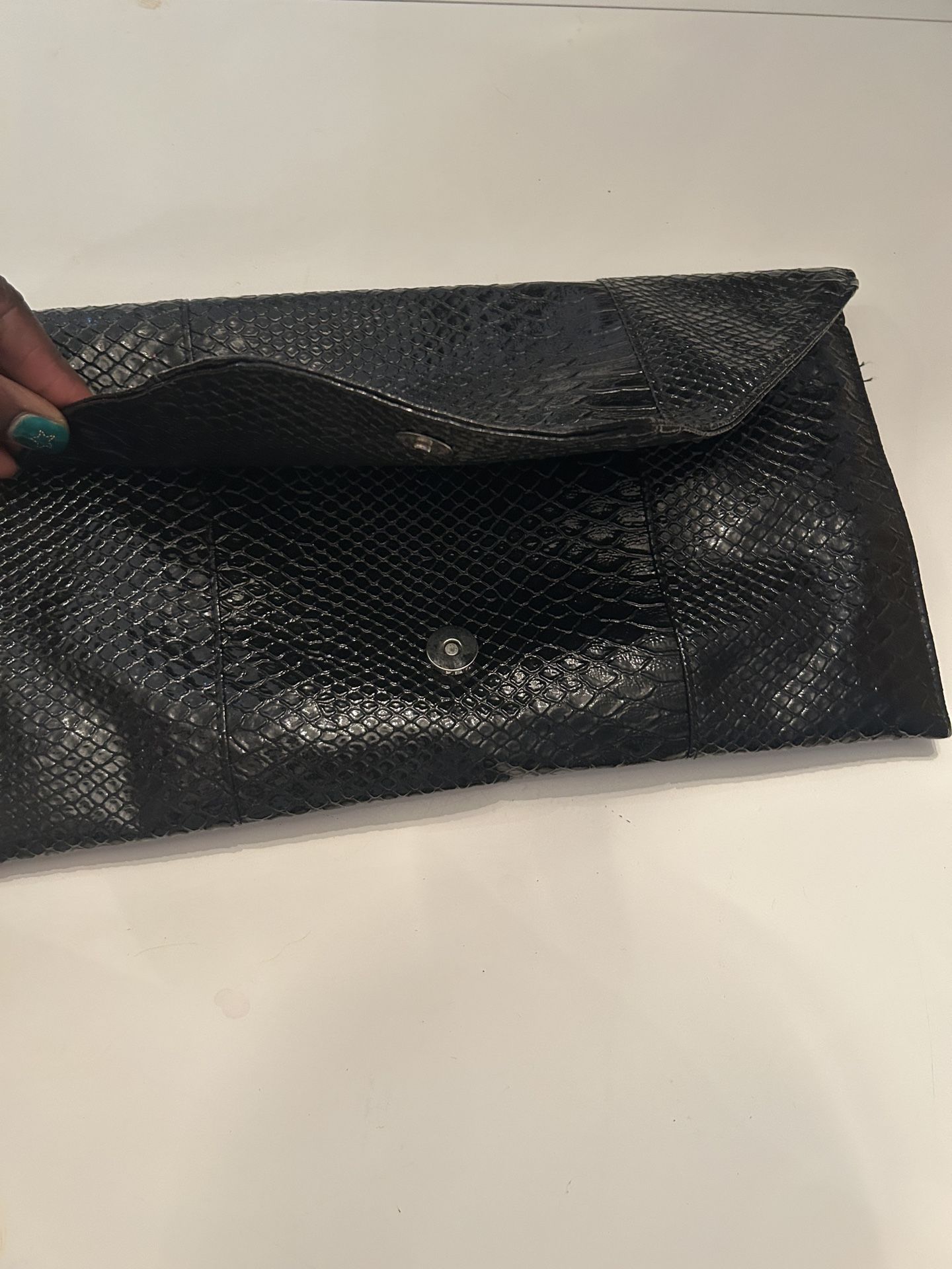Black Snake-skin Textured Woman’s Clutch Bag