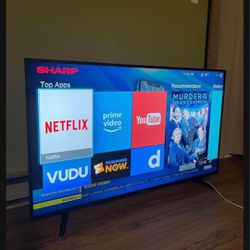 43” sharp smart TV LED HD in excellent condition working with original remote control and power cord 