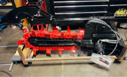 New mini skid steer trencher